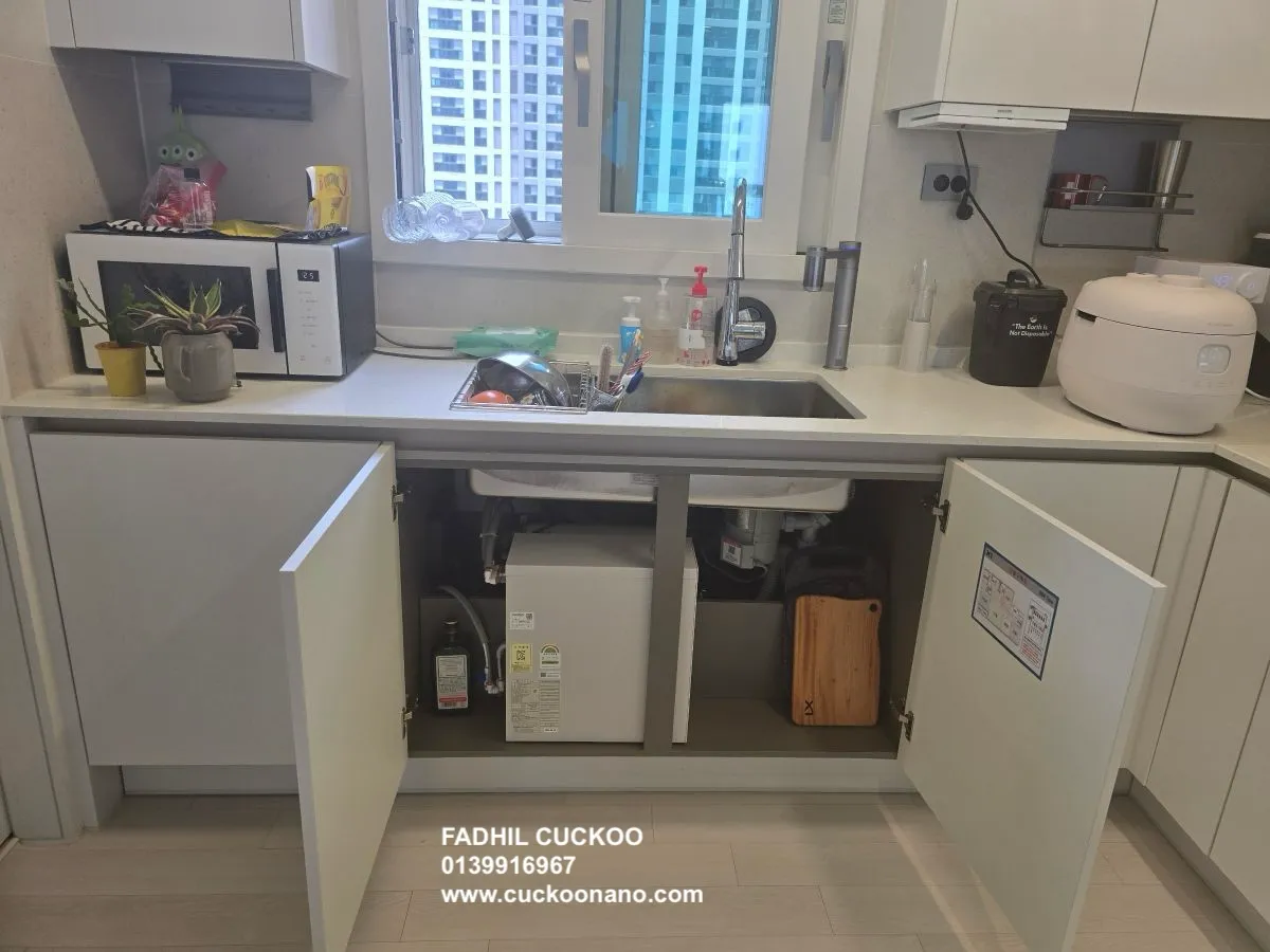 CUCKOO ACE body hidden under the sink inside a kitchen cabinet, real installation 1