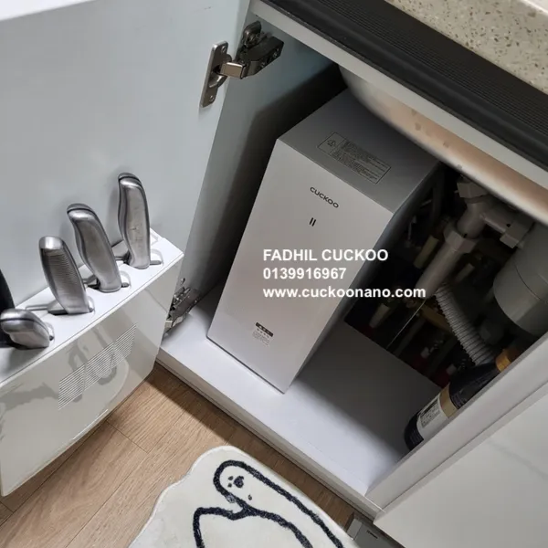 CUCKOO ACE body hidden under the sink inside a kitchen cabinet, real installation 2