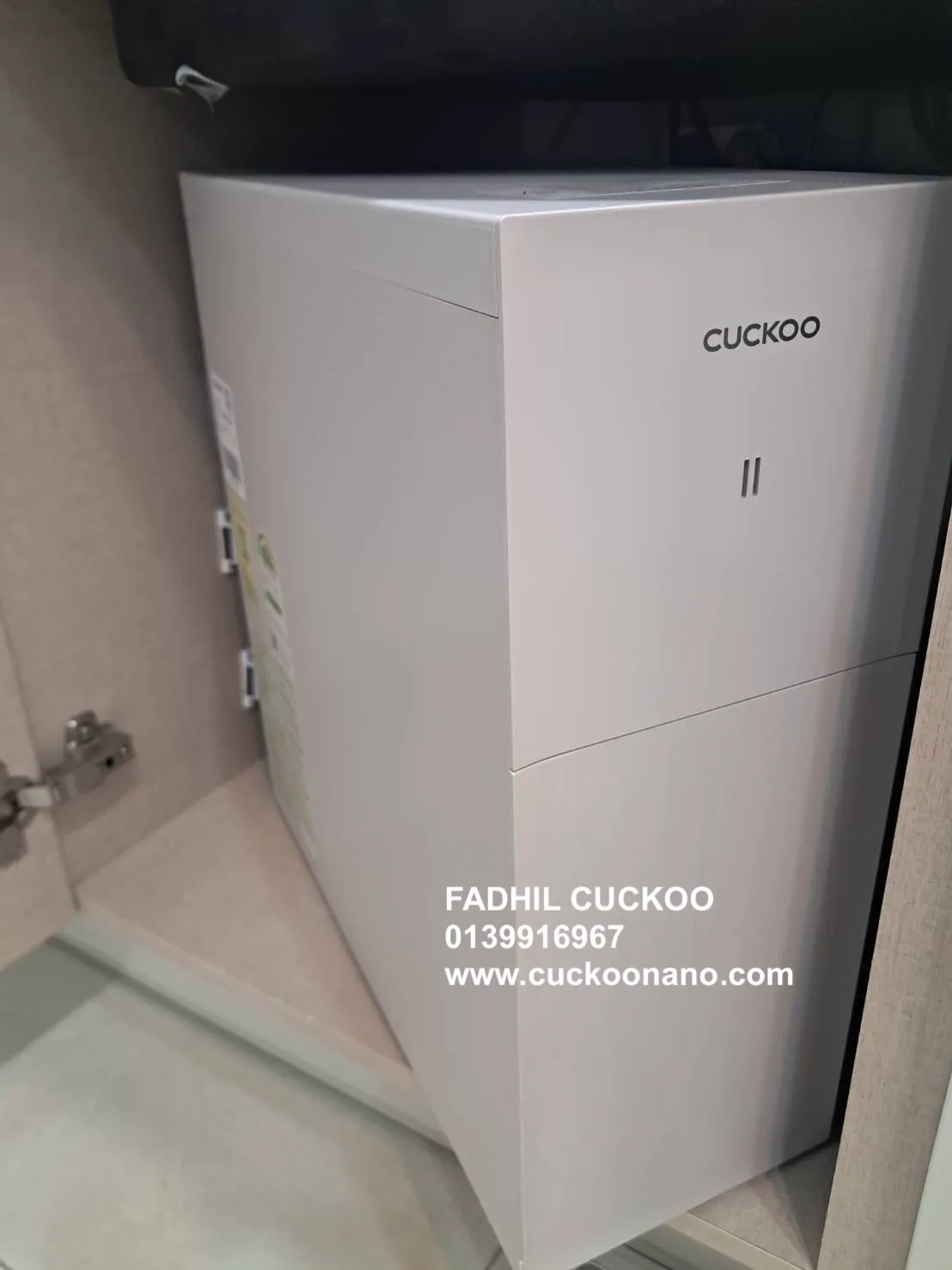 CUCKOO ACE body hidden under the sink inside a kitchen cabinet, real installation 3