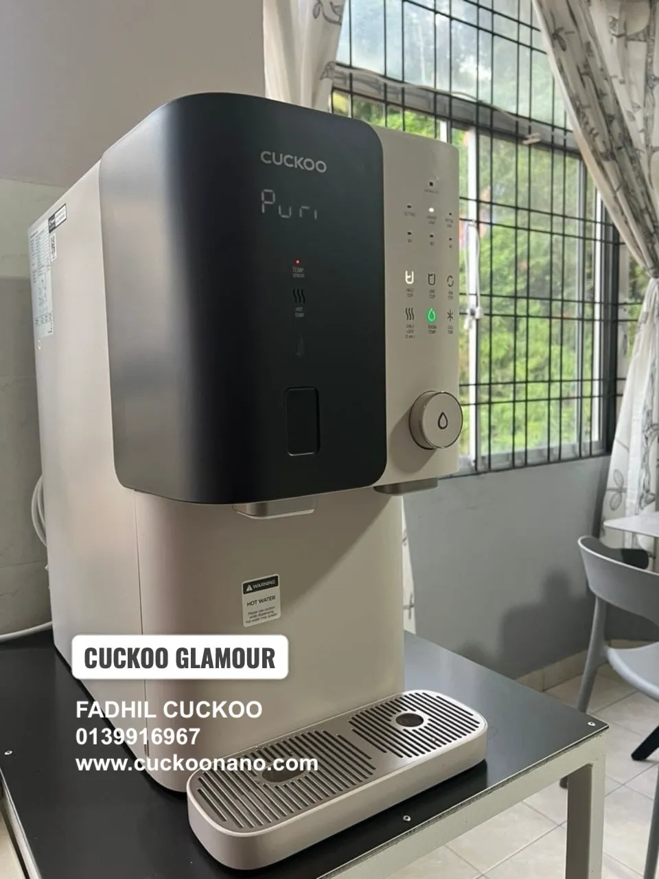 Gambar CUCKOO Glamour water purifier 11 dengan rekaan matte black dan champagne pink